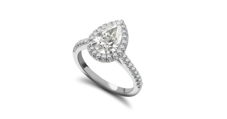 Buying a diamond ring – pear shape halo engagement ring with pavé band in platinum